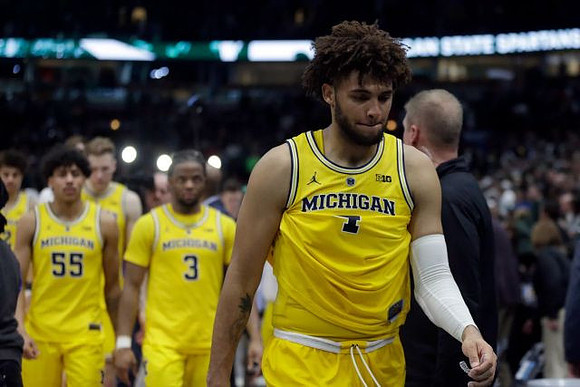 Isaiah Livers (4), Zavier Simpson (3), Eli Brooks (55), and Ignas Brazdeikis (13)