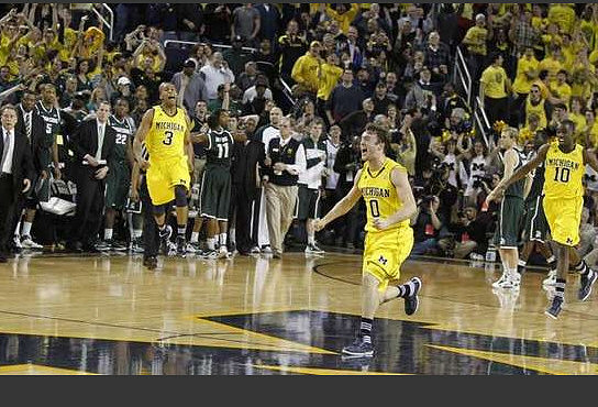 Trey Burke (3), Zack Novak (0), and Tim Hardaway Jr. (10)