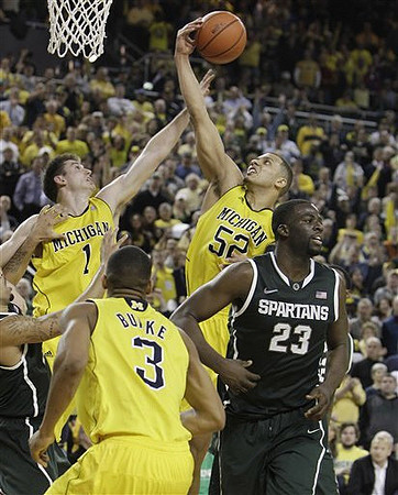Stu Douglass (1), Trey Burke (3), and Jordan Morgan (52)