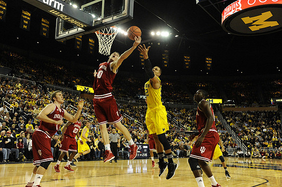 Jordan Morgan (52) and Zack Novak (0)
