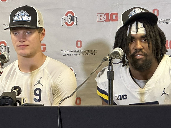J.J. McCarthy (9) and Donovan Edwards (7)