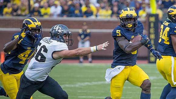 Delano Hill (44), Jabrill Peppers (5), and Jeremy Clark (34)