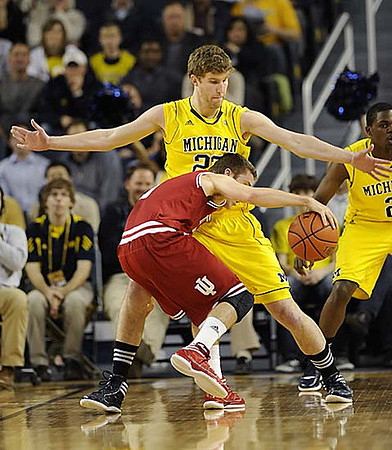 Evan Smotrycz (23) and Carlton Brundidge (2)