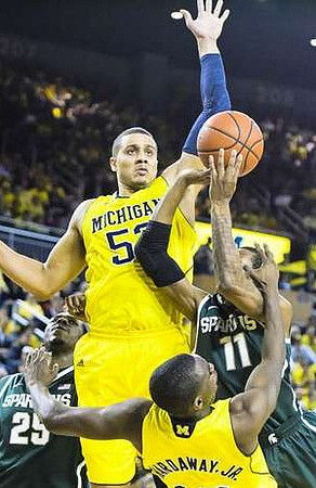 Jordan Morgan (52) and Tim Hardaway Jr. (10)