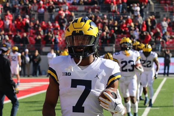 Donovan Edwards (7), CJ Stokes (23), and Tavierre Dunlap (22)