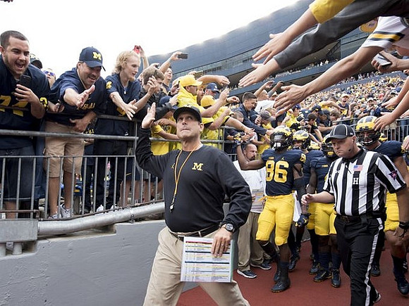Jim Harbaugh and Jehu Chesson (86)