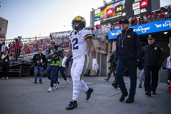 Blake Corum (2) and Jim Harbaugh