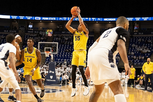 Moussa Diabate (14) and Eli Brooks (55)