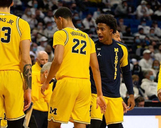 Brandon Johns Jr. (23), Phil Martelli, Caleb Houstan (22), Jace Howard (25), and Juwan Howard