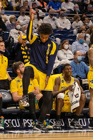 Hunter Dickinson (1), Jace Howard (25), and Moussa Diabate (14)