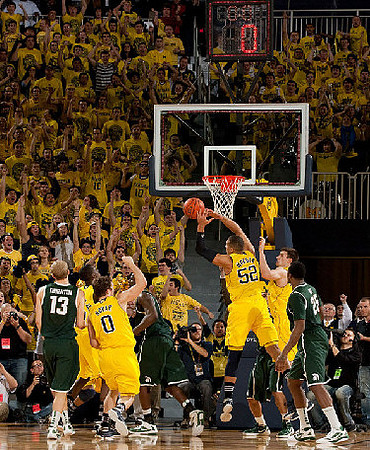 Tim Hardaway Jr. (10), Zack Novak (0), Jordan Morgan (52), and Stu Douglass (1)