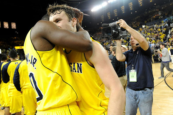 Tim Hardaway Jr. (10) and Zack Novak (0)