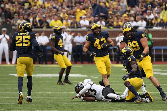 Dymonte Thomas (25), Delano Hill (44), Ben Gedeon (42), Jabrill Peppers (5), and De'Veon Smith (4)