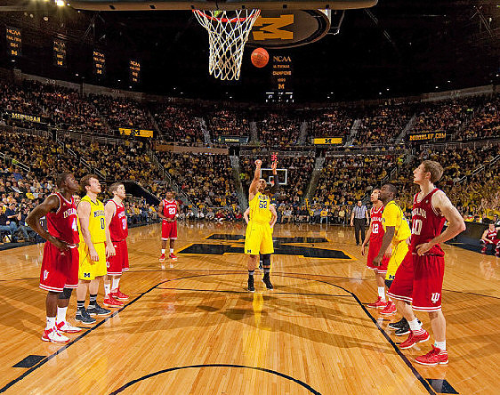 Jordan Morgan (52), Zack Novak (0), and Tim Hardaway Jr. (10)