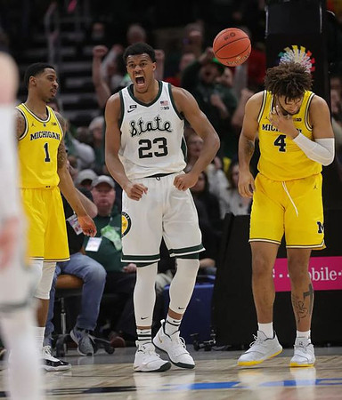 Charles Matthews (1) and Isaiah Livers (4)