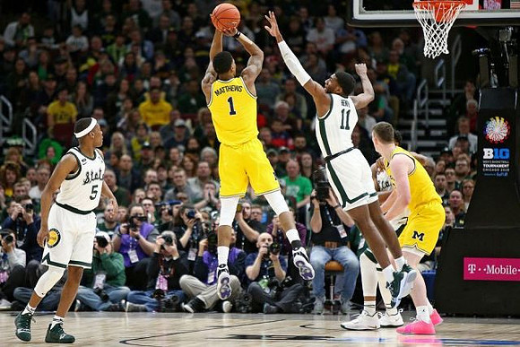 Charles Matthews (1) and Jon Teske (15)
