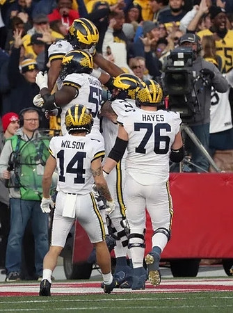 Roman Wilson (14), Donovan Edwards (7), Olusegun Oluwatimi (55), Trevor Keegan (77), and Ryan Hayes (76)