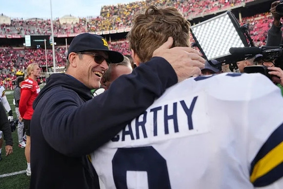 Jim Harbaugh and J.J. McCarthy (9)