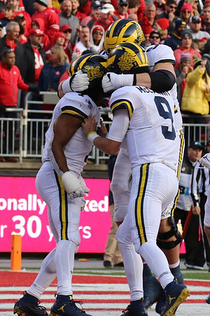 Donovan Edwards (7) and J.J. McCarthy (9)