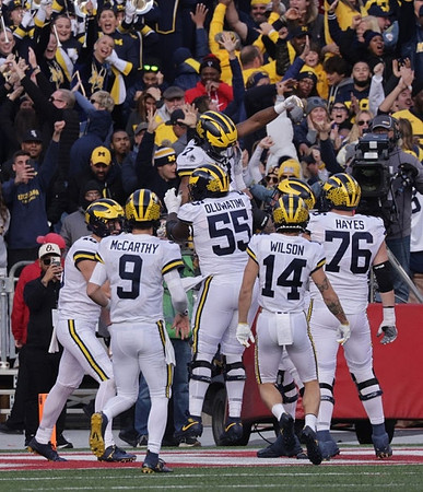 Colston Loveland (18), J.J. McCarthy (9), Donovan Edwards (7), Olusegun Oluwatimi (55), Roman Wilson (14), and Ryan Hayes (76)