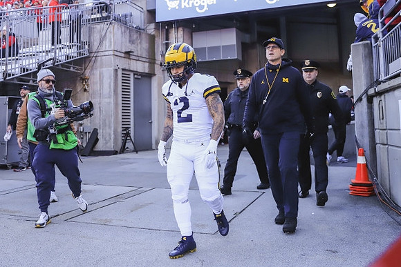 Blake Corum (2) and Jim Harbaugh