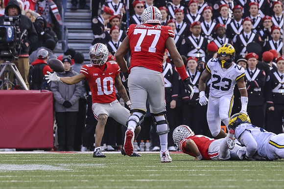Michael Barrett (23) and Will Johnson (2)