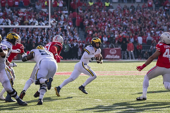 Karsen Barnhart (52), Olusegun Oluwatimi (55), and J.J. McCarthy (9)