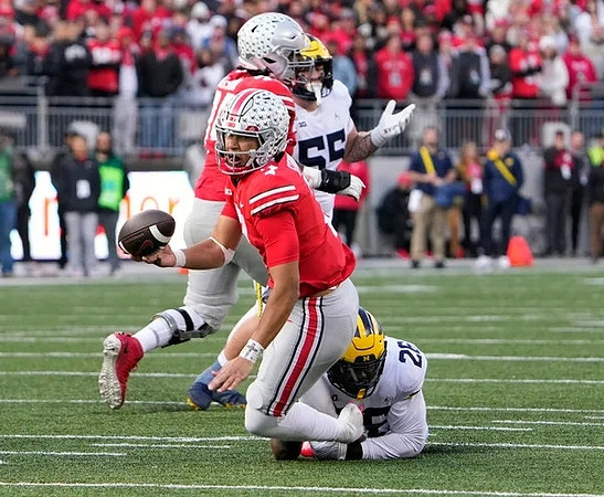 Mason Graham (55) and Rayshaun Benny (26)