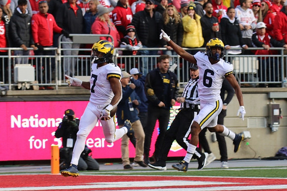 Donovan Edwards (7) and Cornelius Johnson (6)