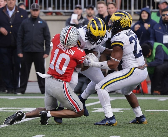 Taylor Upshaw (91) and Michael Barrett (23)