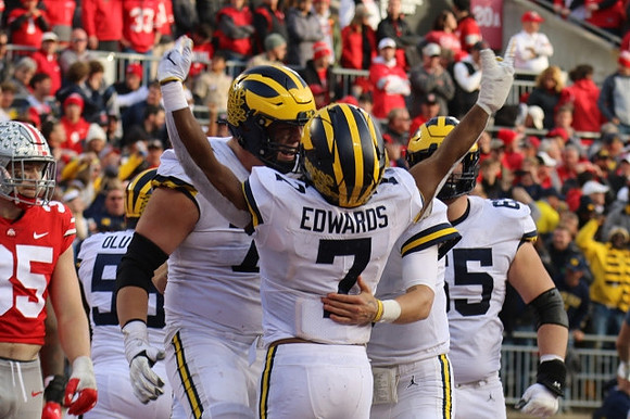 Olusegun Oluwatimi (55), Ryan Hayes (76), Donovan Edwards (7), and Zak Zinter (65)