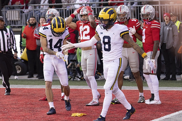 Roman Wilson (14) and Ronnie Bell (8)
