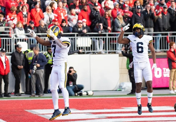Donovan Edwards (7) and Cornelius Johnson (6)