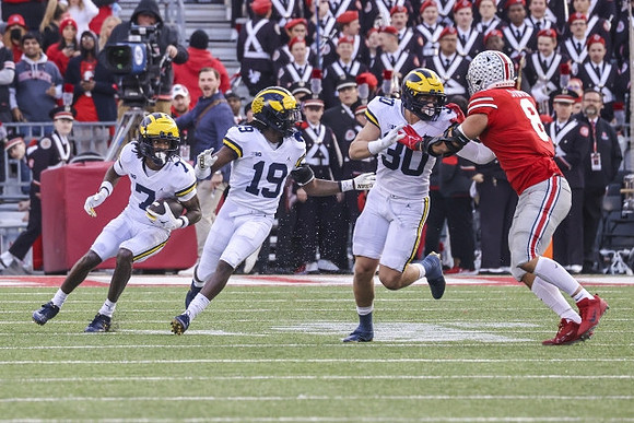 Makari Paige (7), Rod Moore (19), and Jimmy Rolder (30)