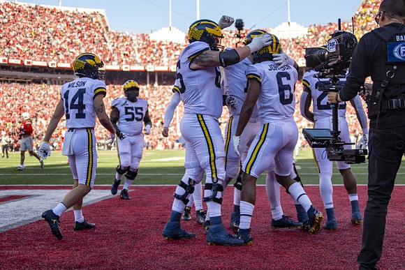 Roman Wilson (14), Olusegun Oluwatimi (55), Zak Zinter (65), Cornelius Johnson (6), and Tavierre Dunlap (22)