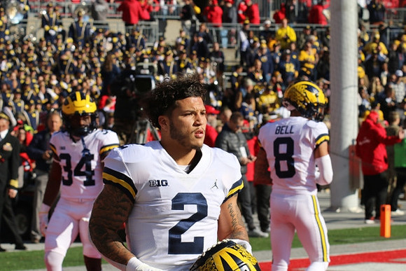 Leon Franklin (34), Blake Corum (2), and Ronnie Bell (8)