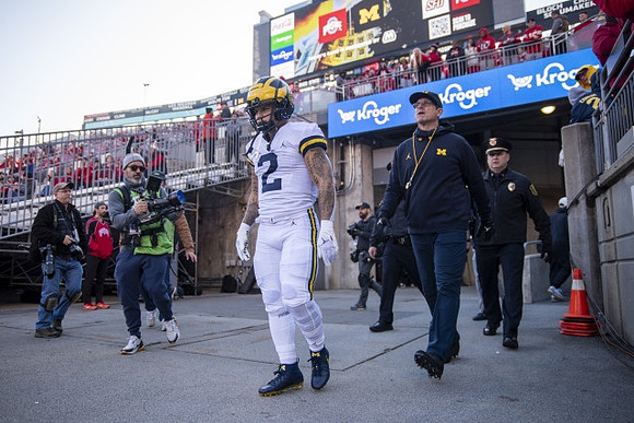 Blake Corum (2) and Jim Harbaugh