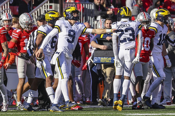 Cornelius Johnson (6), J.J. McCarthy (9), CJ Stokes (23), and Colston Loveland (18)