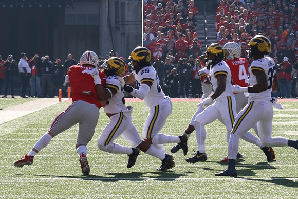 Michael Barrett (23), Junior Colson (25), R.J. Moten (6), and Jaylen Harrell (32)