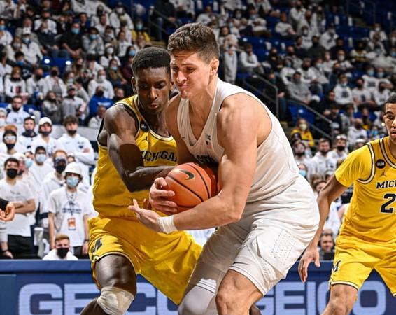 Moussa Diabate (14) and Caleb Houstan (22)