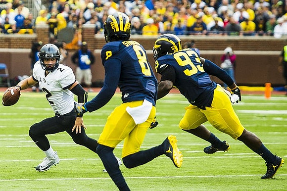 Channing Stribling (8) and Lawrence Marshall (93)