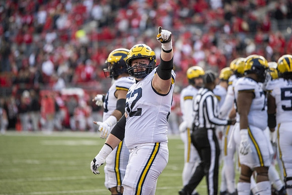 Karsen Barnhart (52) and Michigan Team