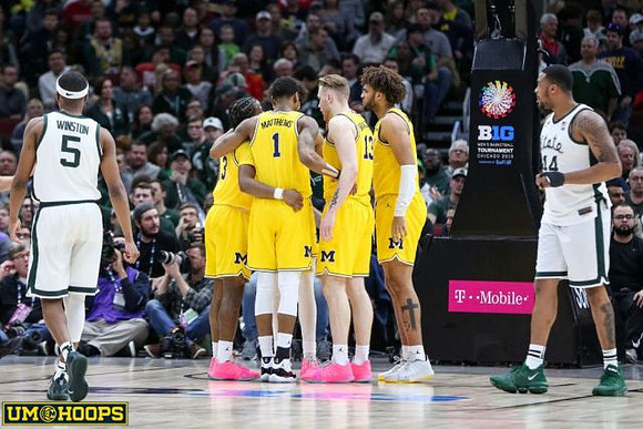 Jordan Poole (2), Charles Matthews (1), Ignas Brazdeikis (13), and Isaiah Livers (4)