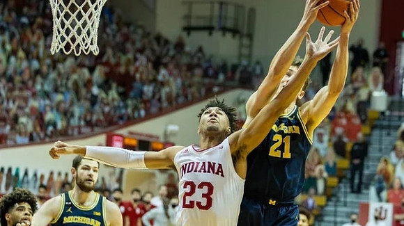 Mike Smith (12), Hunter Dickinson (1), and Franz Wagner (21)
