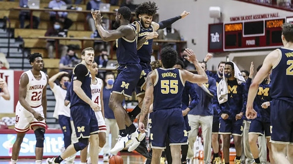 Austin Davis (51), Chaundee Brown Jr. (15), Isaiah Livers (2), Eli Brooks (55), and Franz Wagner (21)