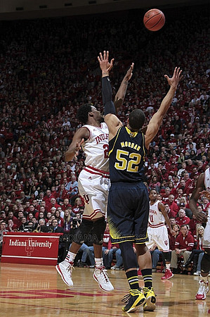 Jordan Morgan (52) and Derrick Walton Jr. (10)