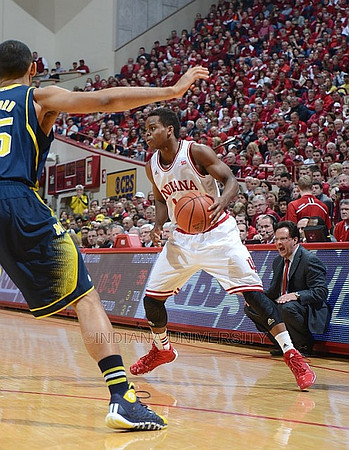Glenn Robinson III (1), Jordan Morgan (52), and Caris LeVert (23)
