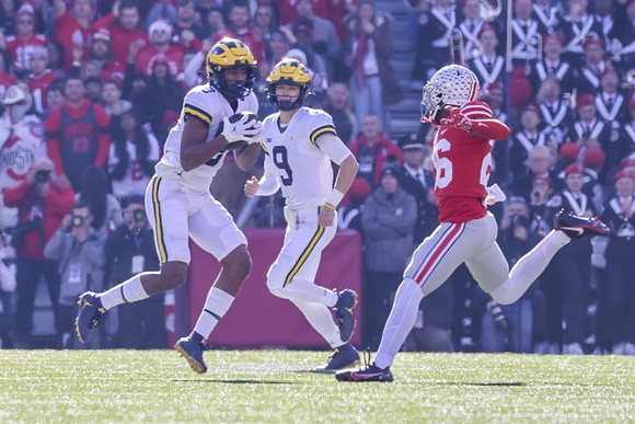 Cornelius Johnson (6) and J.J. McCarthy (9)