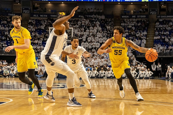 Hunter Dickinson (1) and Eli Brooks (55)