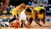 Eli Brooks (55) and Moussa Diabate (14)